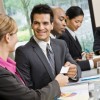 Businessman at Meeting Smiling Businessman at Meeting Smiling